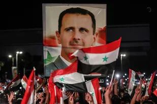 Los festejos de los partidarios de Al-Assad en Damasco