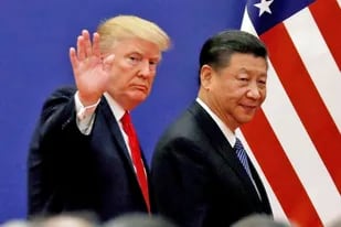 Donald Trump junto a Xi Jinping