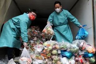 El gobierno de Shanghái está bajo presión para entregar rápidamente suministros de alimentos a la población