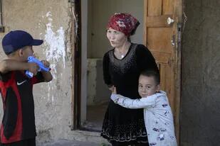 A Gulnar Omirzajh, una kazaja nacida en China, el gobierno le ordenó que se implantara un DIU después de tener a su tercer hijo