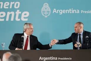 El presidente Alberto Fernández y el exministro de Economía Martín Guzmán