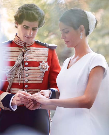 El momento del intercambio de los anillos y la firma de los novios.