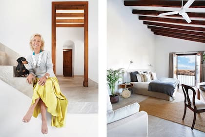 La dueña de casa posando en la escalera que conduce al primer piso. El cuarto de huéspedes jamás está vacío: Mima es una gran anfitriona.