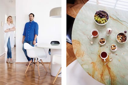 En el sector del comedor, mesa redonda con sillas Eames.