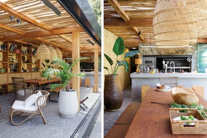 Mesa y bancos de lapacho con base de hierro (OON Architecture). Sillón cabecero ‘Java’ y lámparas ‘Mykonos’ de ratán natural (Compañía Nativa). Macetas (Compañía Nativa). Isla en Neolith ‘New York’ (Marmolería Cavatori) y acero inoxidable (Inoxstations).