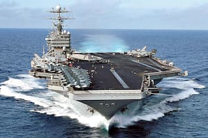 020928-N-3653A-001
At sea with USS George Washington (CVN 73) Sep. 28, 2002 -- The nuclear-powered aircraft carrier transits the Atlantic Ocean as she returns from a regularly scheduled deployment conducting missions in support of Operation Enduring Freedom and Operation Southern Watch. The Washington is homeported in Norfolk, Va. U.S. Navy photo by Photographer's Mate 3rd Class Summer M. Anderson. (RELEASED)