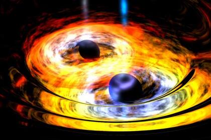 08-11-2021 Dos agujeros negros se fusionan provocando una onda gravitacional.  Un equipo científico internacional ha revelado la mayor cantidad de ondas gravitacionales jamás detectadas, con decenas de nuevos eventos que han multiplicado por diez el registro de detecciones.  POLITICA NASA