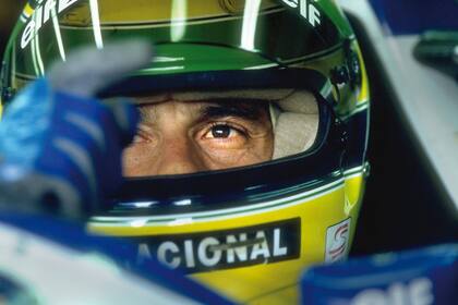 1 MAY 1994: ARYTON SENNA OF BRAZIL SITS IN HIS WILLIAMS RENAULT IN THE PITS WHILE HIS CAR IS PREPARED FOR THE SAN MARINO GRAND PRIX, IMOLA. MICHAEL SCHUMACHER (BENETTON FORD) WON THE RACE WITH NICOLA LARINI (FERRARI) AND MIKA HAKKINEN (MCLAREN PEUGEOT)COMING SECOND AND THIRD RESPECTIVELY.