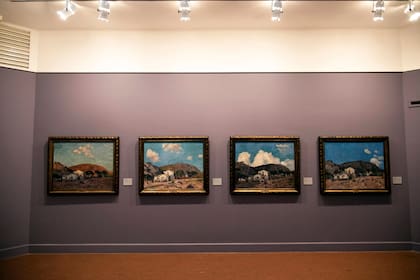 Vista de sala de cuatro de las ocho pinturas de "Las horas del día", serie de Fernando Fader, expuestas en el Museo Juan B. Castagnino. Foto: Marcelo Manera