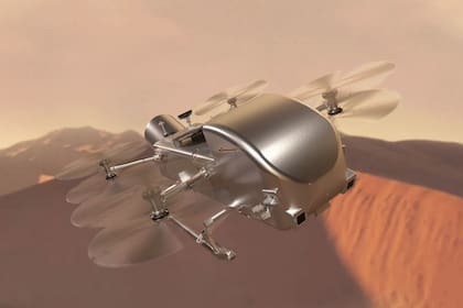 15/04/2024 Impresión artística de Dragonfly volando sobre las dunas de Titán, la luna de Saturno. POLITICA INVESTIGACIÓN Y TECNOLOGÍA NASA/JOHNS HOPKINS APL/STEVE GRIBBEN