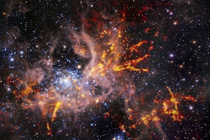 16/06/2022 Violenta formación estelar en la nebulosa de la Tarántula.  Astrónomos han desvelado nuevos detalles de la región de formación estelar 30 Doradus, también conocida como nebulosa de la Tarántula, utilizando el Atacama Large Millimeter/submillimeter Array (ALMA).  POLITICA INVESTIGACIÓN Y TECNOLOGÍA ESO