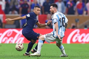18 December 2022, Qatar, Lusail: Soccer, World Cup 2022 in Qatar, Argentina - France, final, at Lusail Stadium, Argentina's Lionel Messi (r) plays against France's Kylian Mbappe. Photo: Tom Weller/dpa (Photo by Tom Weller/picture alliance via Getty Images)