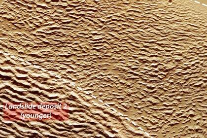 23/08/2023 Deslizamientos de tierra y desprendimientos de rocas alrededor del Olympus Mons.  La misión Mars Express de la ESA ha dirigido cámara estéreo de alta resolución (HRSC) hacia el volcán más imponente de Marte, revelando su espectacular entorno y su turbulento pasado.  POLITICA INVESTIGACIÓN Y TECNOLOGÍA ESA