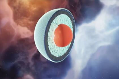 28/12/2023 Impresión artística de las diferentes capas dentro de una estrella de neutrones masiva, con el círculo rojo representando un núcleo considerable de materia de quarks. POLITICA INVESTIGACIÓN Y TECNOLOGÍA JYRKI HOKKANEN, CSC