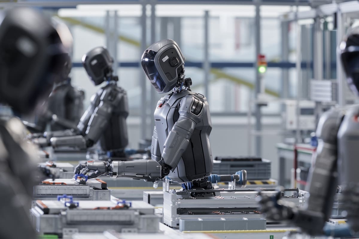 3D Render: Industrial AI Transformation: Advanced Human Like Robot Working in Industrial Environment. Autonomous AI Powered General Purpose Humanoid Robots Work at Factory on Assembly Line.