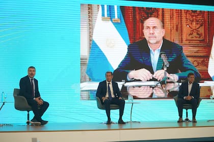 Perotti, Gutiérrez y Suárez, durante el debate en IDEA