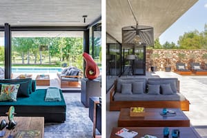 Una casa que modera la luz con interiores en negro y tiene un comedor-quincho espectacular