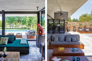 Una casa que modera la luz con interiores en negro y tiene un comedor-quincho espectacular