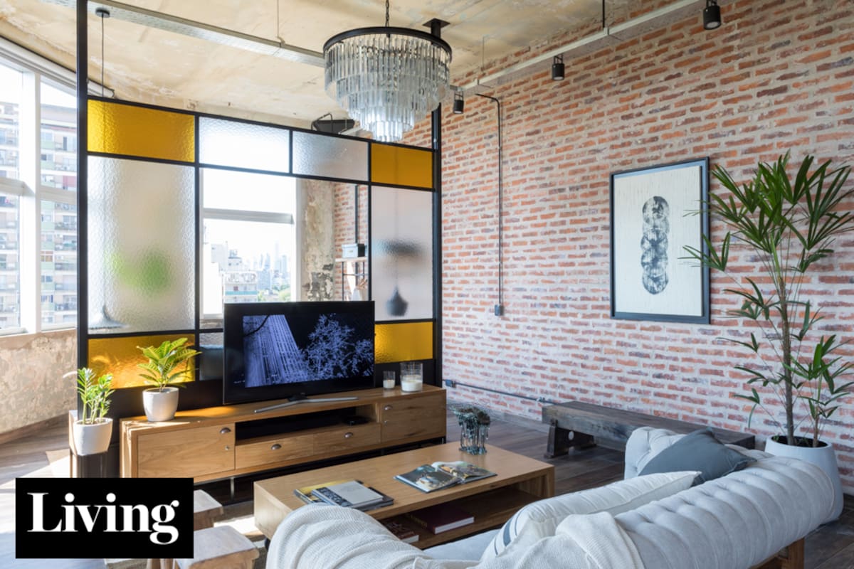 Al día. Con estética fabril, un moderno loft rescata las huellas de un edificio histórico