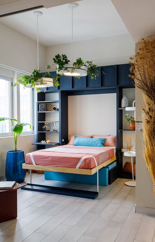 Diseño en juego. Cómo se hizo este monoambiente domotizado con muebles a medida, barra de lujo y cama rebatible
