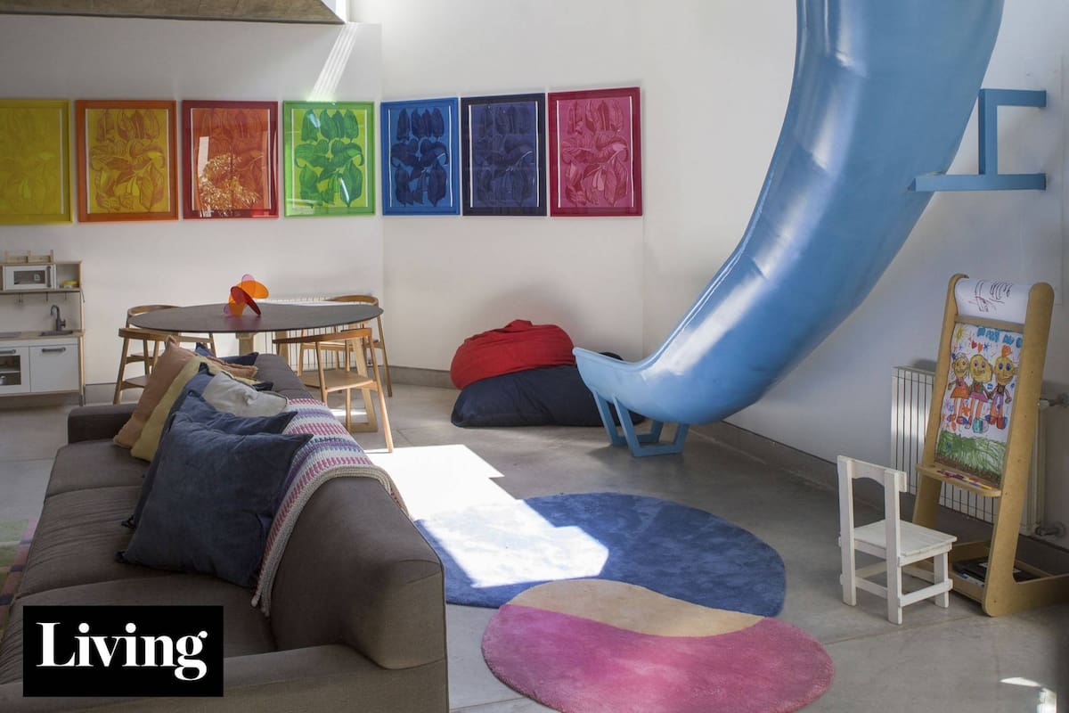 ¿Un tobogán en el living? Mirá cómo se transformó esta casa-taller en un hogar familiar lleno de color