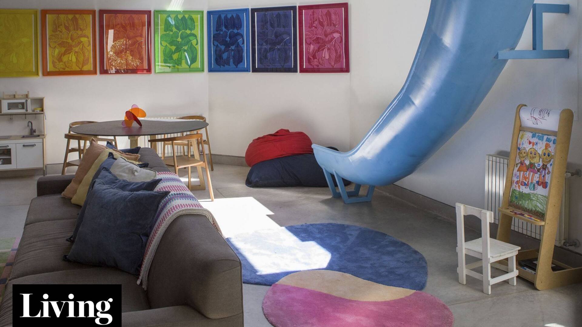 ¿Un tobogán en el living? Mirá cómo se transformó esta casa-taller en un hogar familiar lleno de color