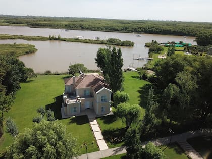 La oferta. Una casa de 65 m2 cubiertos en un lote de 1200 m2 sobre el río Paraná de las Palmas se vende a US$ 65.000