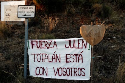 A banner that reads "Force Julen! Totalan is with you", is seen at the area where Julen, a Spanish two-year-old boy fell into a deep well four days ago when the family was taking a stroll through a private estate, in Totalan, southern Spain, January 17, 2019. REUTERS/Jon Nazca