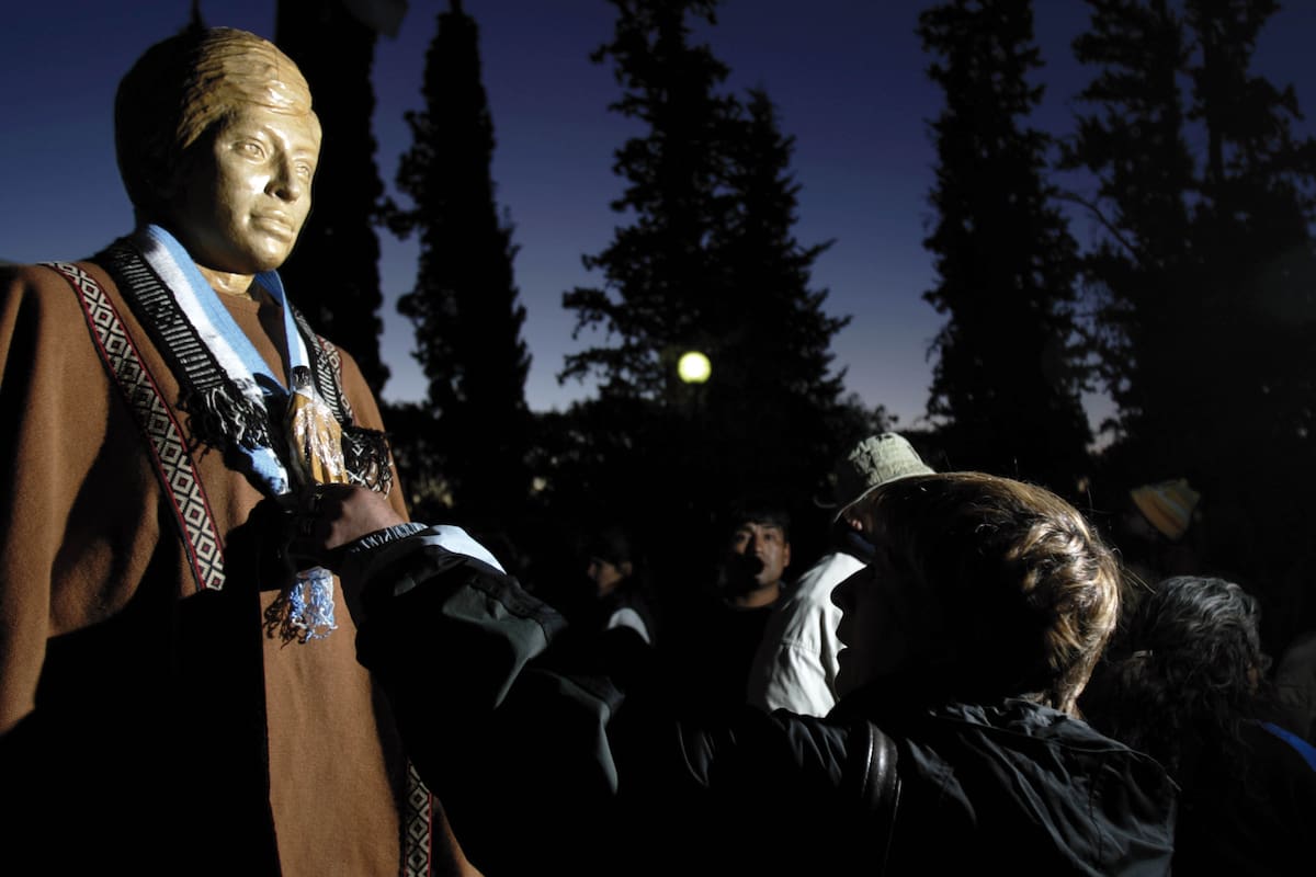 A faithful touches an Argentine Indian Ceferino Namuncura's statue at his sanctuary in Chimpay, southern Argentina, Saturday, Nov. 10, 2007. The first Argentine Indian to be beatified by the Roman Catholic church will be recognized by a papal envoy at a ceremony Sunday attended by thousands of faithful. Namuncura, the son of a Mapuche Indian chief who lived from 1886 until 1905, has a wide following among the Argentina's poor. Pope Benedict XVI signed a decree in July beatifying Namuncura. (AP Photo/Natacha Pisarenko)