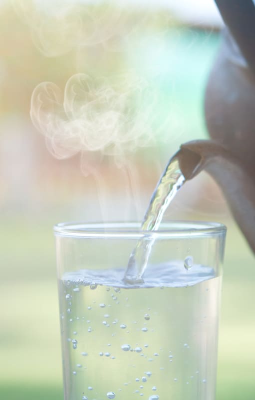 A glass of hot water from the old kettle.