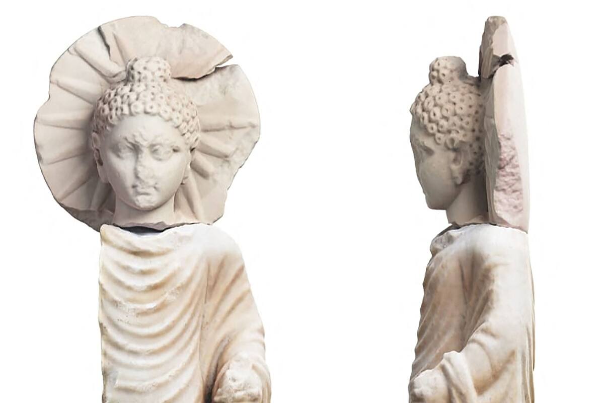 A handout picture released by the Egyptian Ministry of Tourism and Antiquities on April 27, 2023 shows a statue of Buddha uncovered in Egypt's ancient seaport of Berenice, now known as Medinet el Haras, shedding light on the ancient trade ties with India under the Roman empire. (Photo by Egyptian Ministry of Antiquities / AFP) / === RESTRICTED TO EDITORIAL USE - MANDATORY CREDIT "AFP PHOTO / HO / EGYPTIAN MINISTRY OF ANTIQUITIES- NO MARKETING NO ADVERTISING CAMPAIGNS - DISTRIBUTED AS A SERVICE TO CLIENTS ==