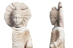 A handout picture released by the Egyptian Ministry of Tourism and Antiquities on April 27, 2023 shows a statue of Buddha uncovered in Egypt's ancient seaport of Berenice, now known as Medinet el Haras, shedding light on the ancient trade ties with India under the Roman empire. (Photo by Egyptian Ministry of Antiquities / AFP) / === RESTRICTED TO EDITORIAL USE - MANDATORY CREDIT "AFP PHOTO / HO / EGYPTIAN MINISTRY OF ANTIQUITIES- NO MARKETING NO ADVERTISING CAMPAIGNS - DISTRIBUTED AS A SERVICE TO CLIENTS ==
