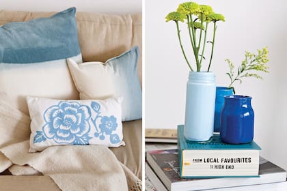 A la izq., almohadones teñidos de 60x60 y otro rectangular con flores celestes (Boulevard Sáenz Peña). A la der., frascos de vidrio pintados se convierten en floreros y adornos para una mesa de café.