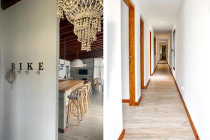 A la izquierda, el pasillo de planta baja que distribuye hacia los cuatro dormitorios. Todos los pisos de la casa son de porcellanato símil madera (Lourdes). Banquetas (Perla & Co).