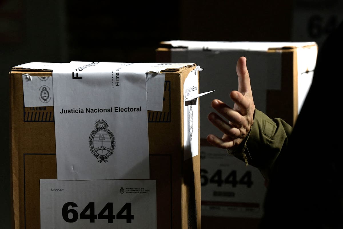 A man casts his vote at a polling station during primary elections in Buenos Aires on August 13, 2023. (Photo by JUAN MABROMATA / AFP)
