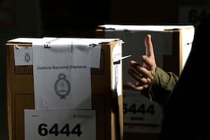 A man casts his vote at a polling station during primary elections in Buenos Aires on August 13, 2023. (Photo by JUAN MABROMATA / AFP)