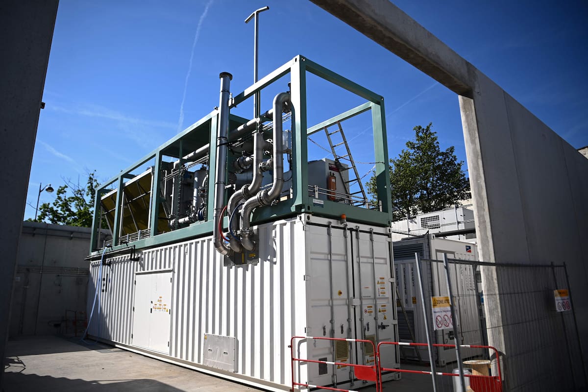 A photograph shows an hydrogen production unit at an Hysetco hydrogen production and distribution station ahead of its opening in June, in Paris on May 11, 2022. (Photo by Christophe ARCHAMBAULT / AFP)
