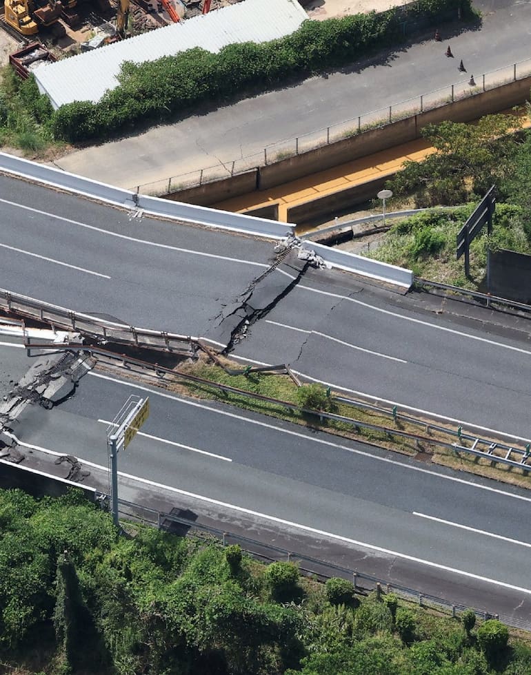 A section of a damaged expressway is seen in Yatsushiro, Kumamoto Prefecture, on July 29, 2026, after an earthquake struck southwestern Japan the previous day. (Photo by JIJI PRESS / AFP) / Japan OUT