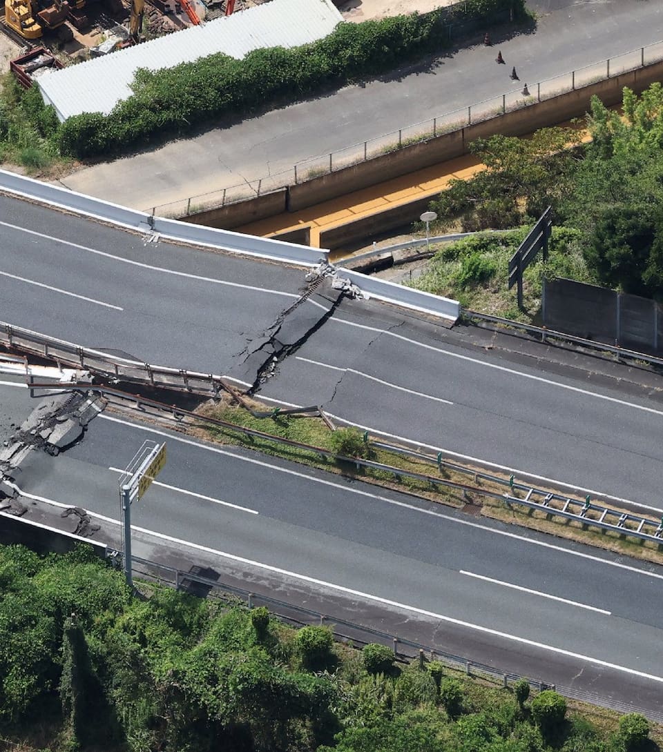 A section of a damaged expressway is seen in Yatsushiro, Kumamoto Prefecture, on July 29, 2026, after an earthquake struck southwestern Japan the previous day. (Photo by JIJI PRESS / AFP) / Japan OUT
