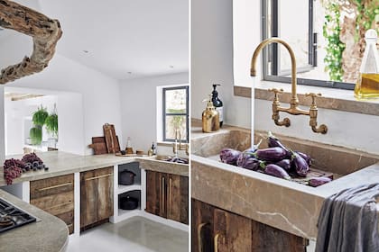 En la cocina se hizo una abertura para que el living compartiera su luz y su vista con la cocina. Y quedó al descubierto el grosor de los muros. Además, un tronco curvo al natural se colocó como viga.