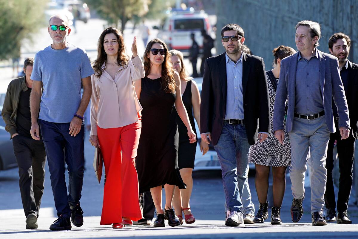 Actors Dario Grandinetti and Andrea Frigerio, producer Barbara Sarasola-Day, director Benjamin Naishtat and actor Alfredo Castro arrive to a photocall to promote the Official Selection feature film "Rojo" at the San Sebastian Film Festival, Spain, September 23, 2018. REUTERS/Vincent West