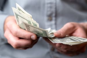 Adult man hands count money dollars