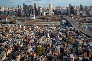 Aerial view of Villa 31, one of the largest slums in Buenos Aires, taken on May 23, 2020 during the COVID-19 novel coronavirus pandemic. - Overcrowded neighbourhoods and a big population within poverty levels are a big challenge Latin American countries are facing during this global pandemic. (Photo by Emiliano LASALVIA / AFP)