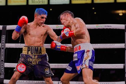 Ahora con la zurda: Martínez llega al mentón del filipino Ancajas