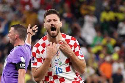 AL RAYYAN, QATAR - DECEMBER 09: Bruno Petkovic of Croatia celebrates after scoring the team's first goal during the FIFA World Cup Qatar 2022 quarter final match between Croatia and Brazil at Education City Stadium on December 09, 2022 in Al Rayyan, Qatar. (Photo by Lars Baron/Getty Images)