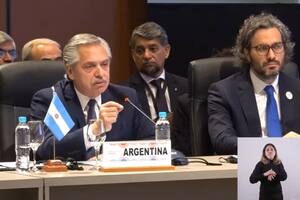 Alberto Fernández, Santiago Cafiero y Gustavo Martínez Pandiani