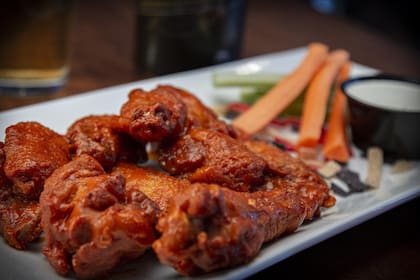 Alitas de pollo, es uno de los platos favoritos para disfrutar del Super Bowl