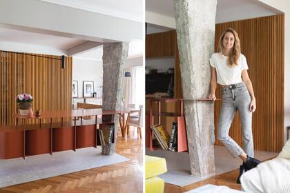 Ana Ottone, cofundadora del estudio Ottone-Victorica, junto a la atípica columna que descubrió al demoler la pared que cerraba el living. Para darle relevancia, la hizo soporte de una barra que tiene nichos con acceso duplicado: se aprovechan desde el living y desde la cocina.