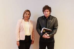 Andrea Almirón y Javier Milei