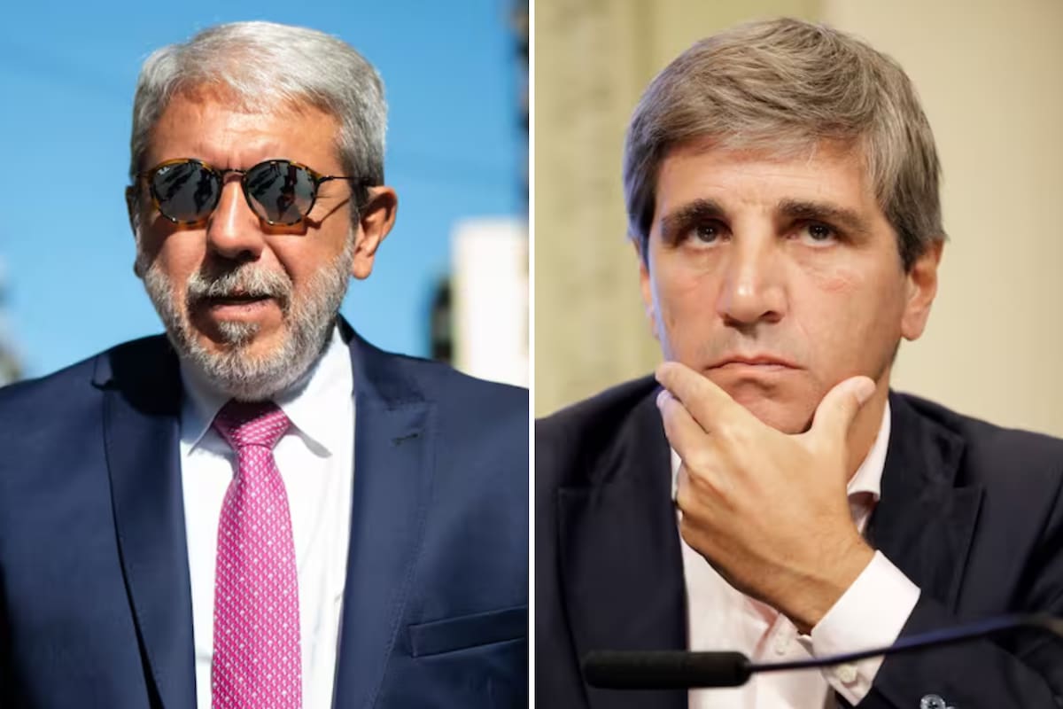 Aníbal Fernández y Luis Caputo